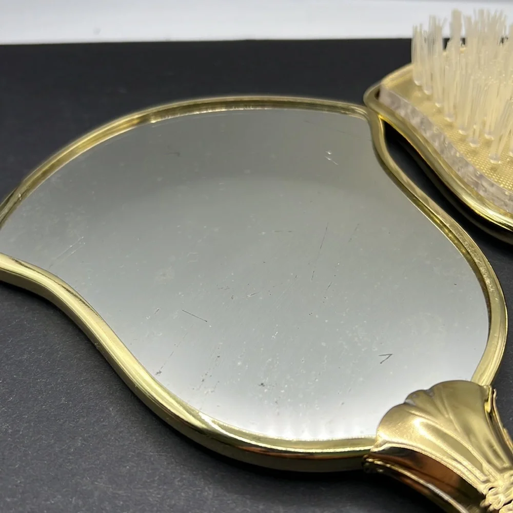 Vintage flower vanity hand mirror and brush